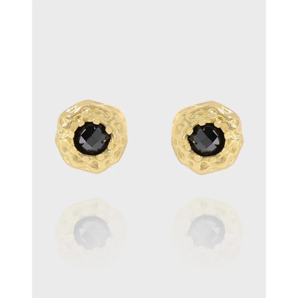Pair of polished sterling silver textured bead stud earrings with black faceted centers