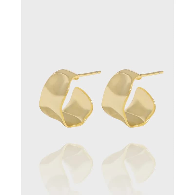 Polished curved square hoop earrings with irregular, open-loop design displayed on a light background.