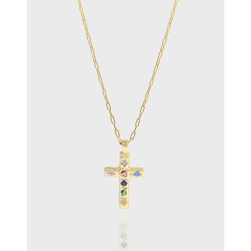 Polished sterling silver cross pendant with multicolored stones on a fine chain