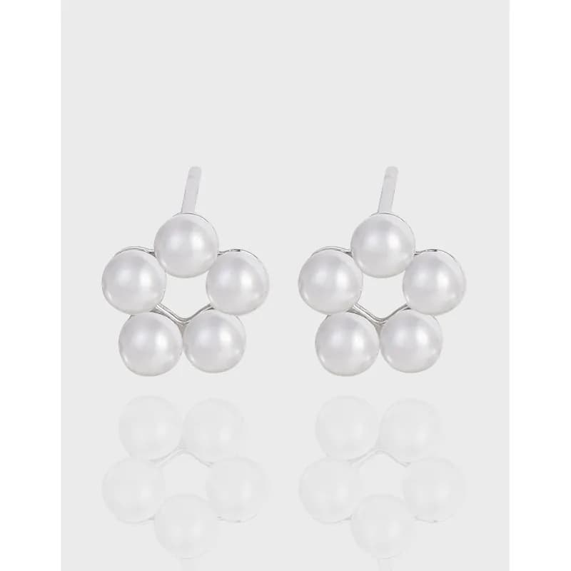Polished sterling silver pearl cluster earrings with four white pearls in a floral-inspired arrangement