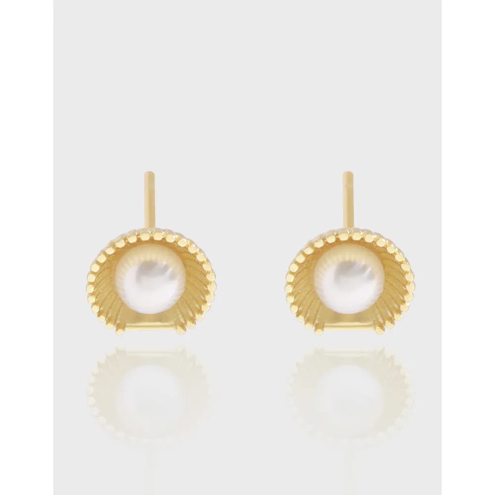 Polished sterling silver pearl-studded sunburst earrings with a scalloped outer rim.