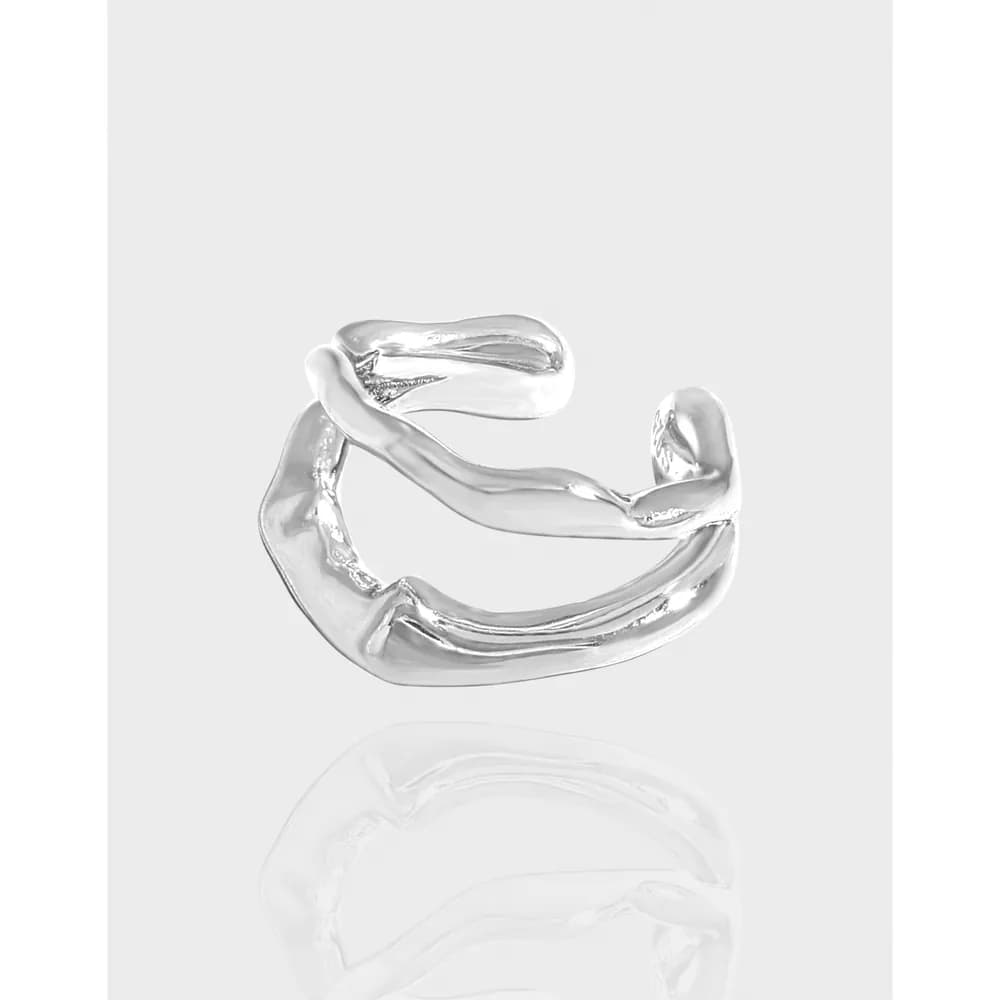 Polished sterling silver open hoop earring with a twisted, organic shape