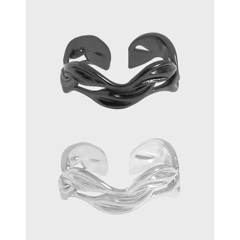 Sterling silver ring with a twisted wave design and enamel finish in black option, shown in a two-tone presentation.