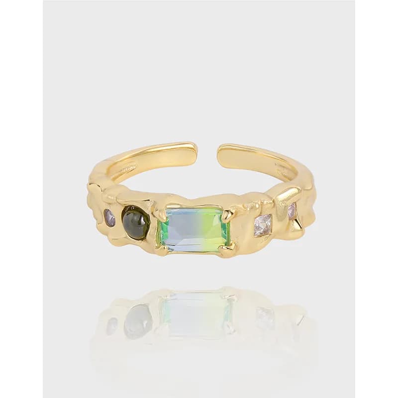 Polished sterling silver open ring with an iridescent rectangular center stone and side accents.