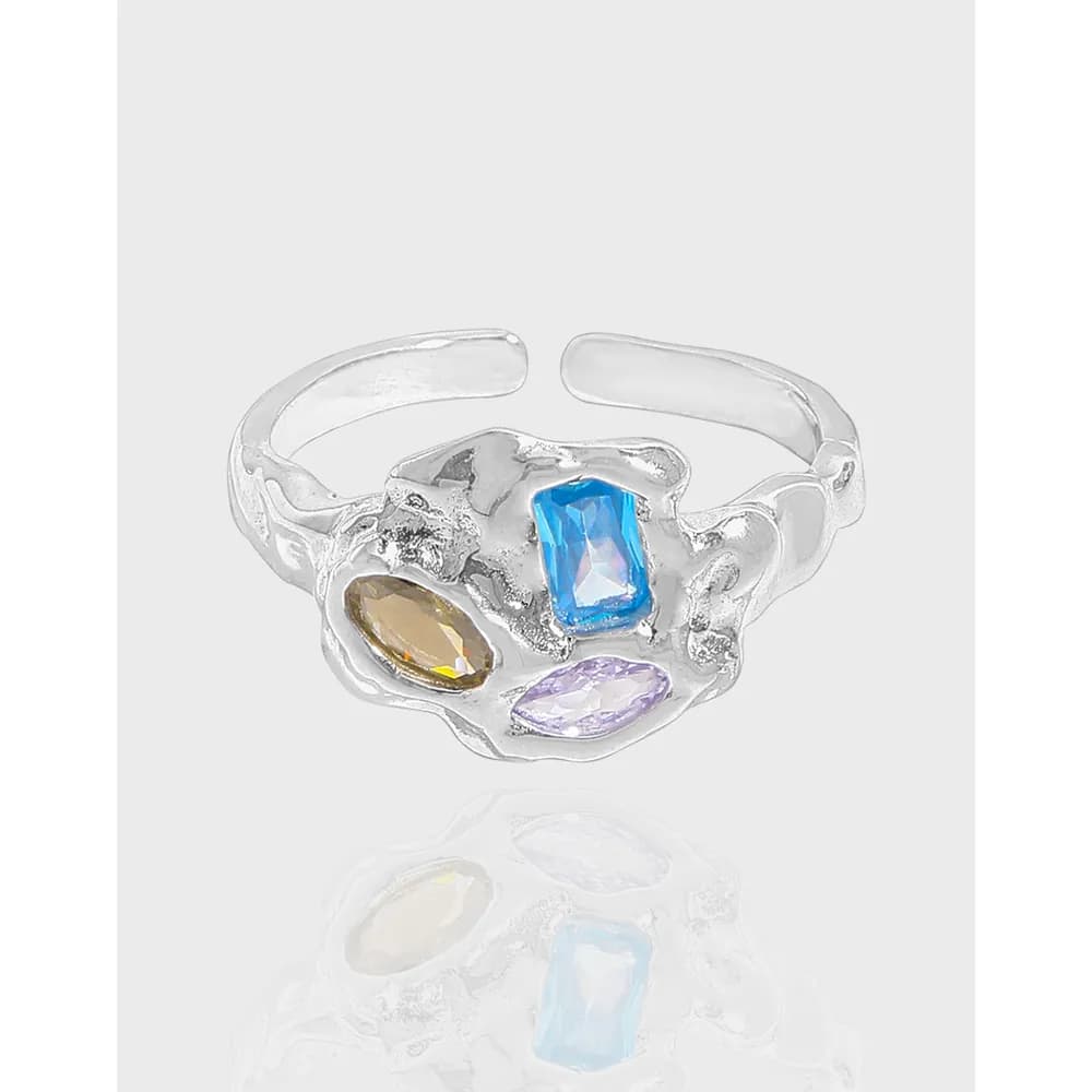 Open-band sterling silver ring with a clustered trio of colorful gemstone-like stones