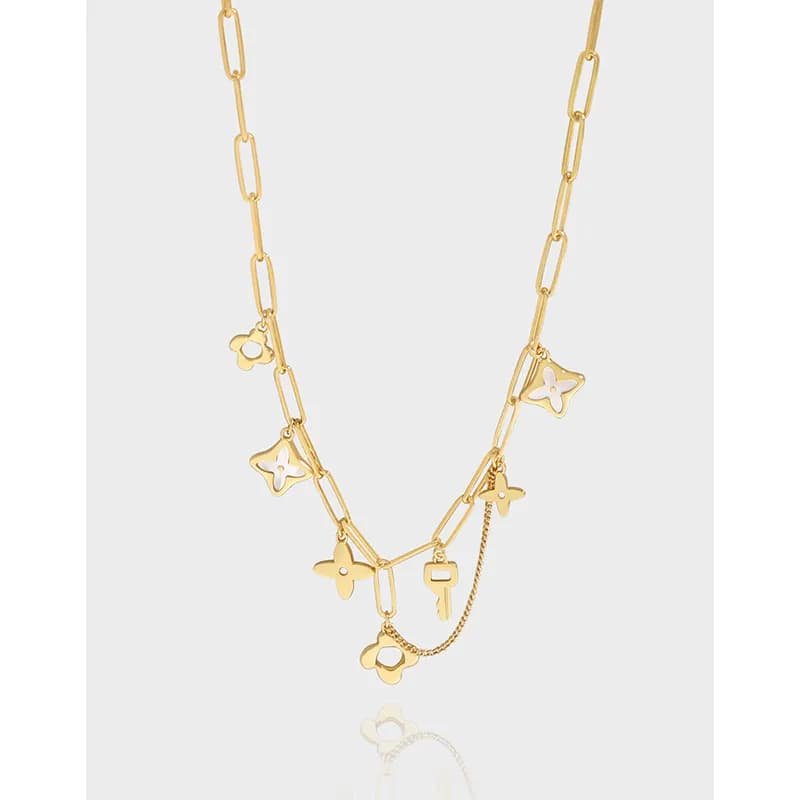 Two-layer polished sterling silver necklace with rectangular links and scattered flower charms.
