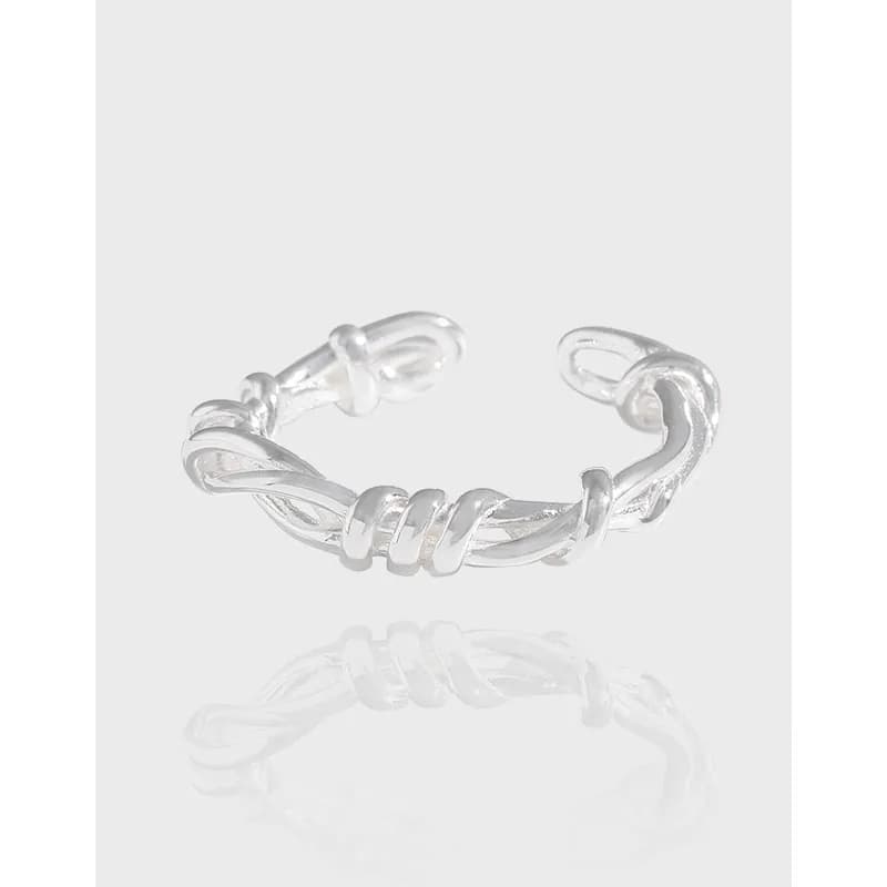 Polished sterling silver open ring with a twisted rope design and knotted ends