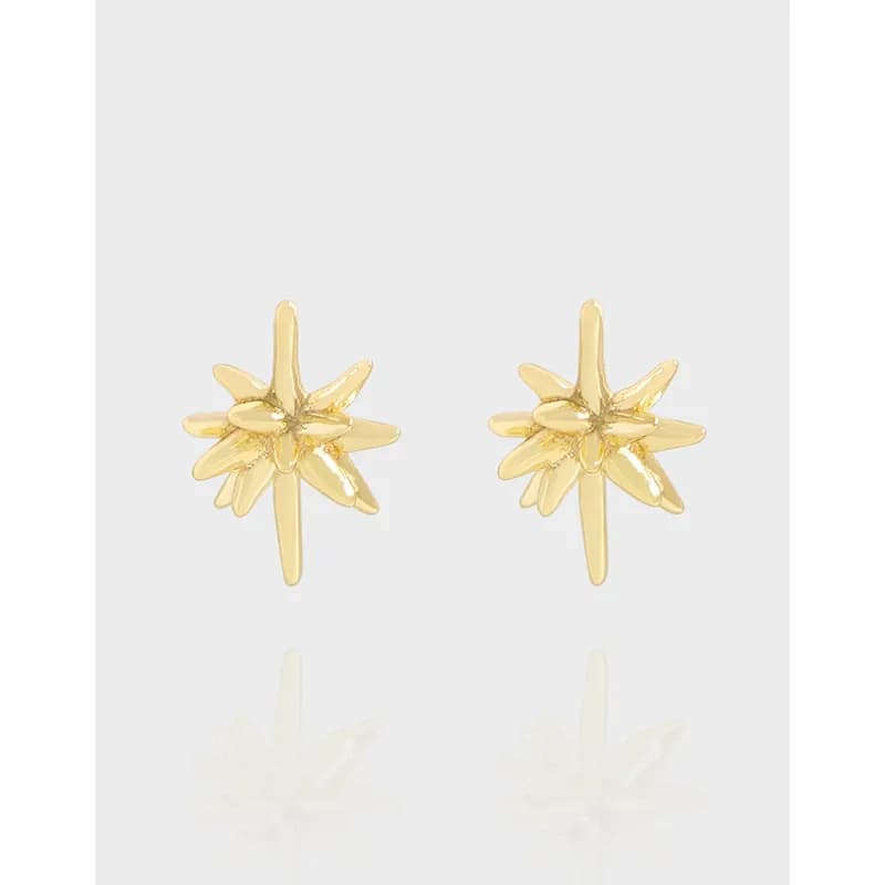 Gold-tone sunburst stud earrings with multi-petal petals arranged in a starburst pattern.