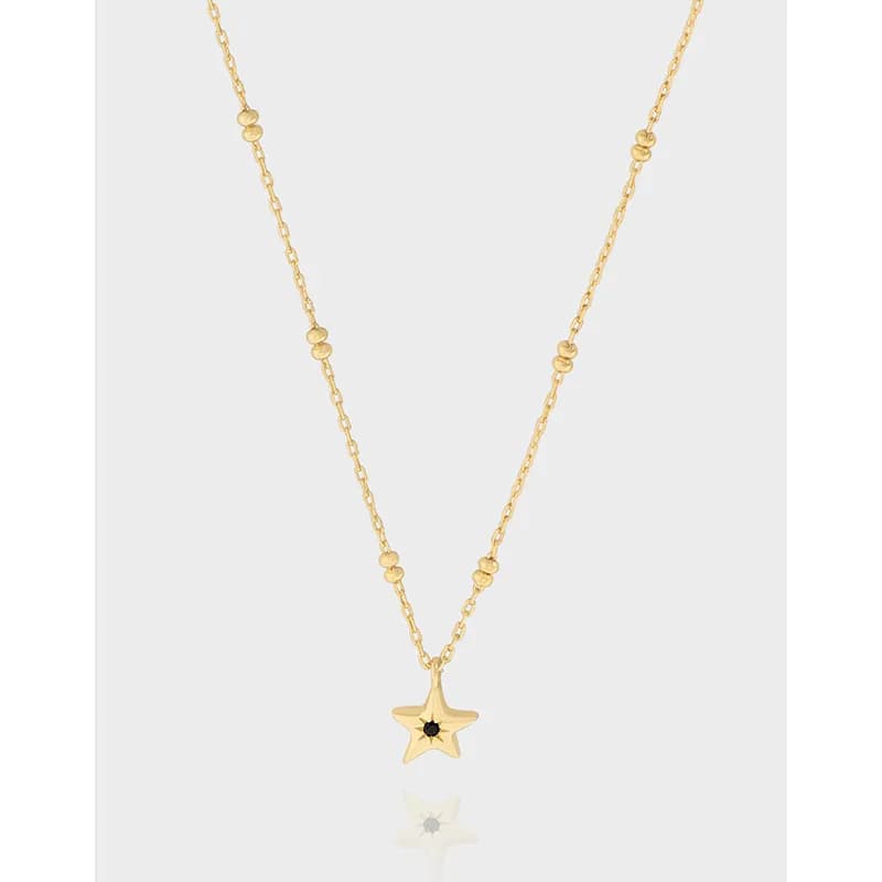 Delicate star pendant necklace with bead-accent chain