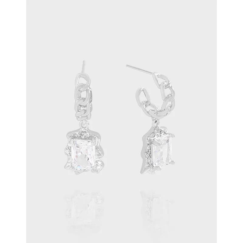 Polished sterling silver drop earrings with chain-link detail and rectangular clear stone