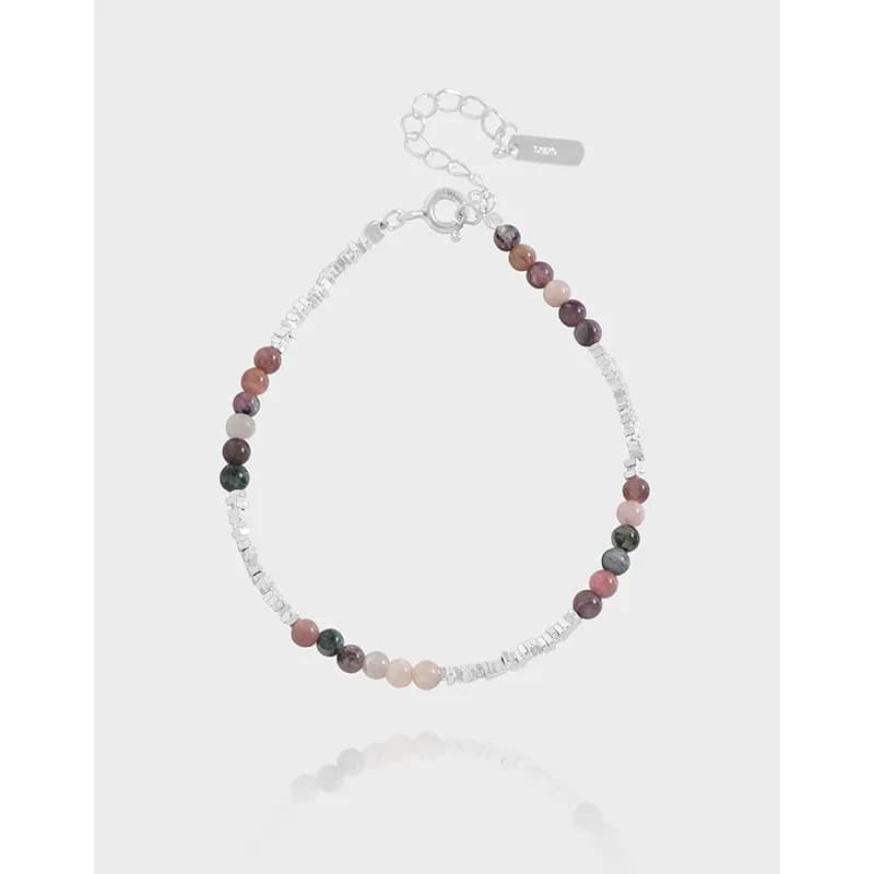 Polished sterling silver bracelet with pastel round beads and small silver spacers