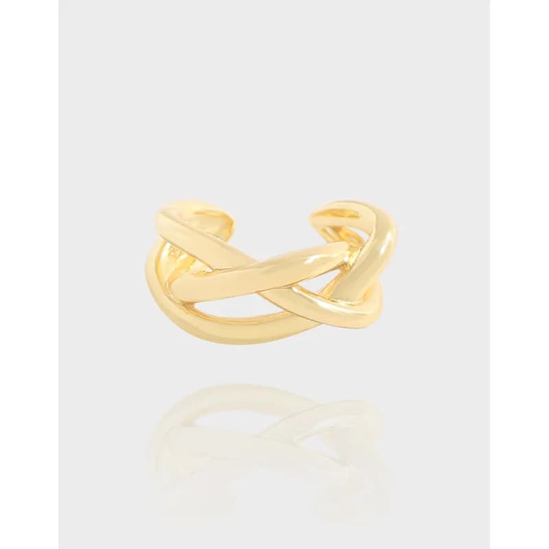 Polished sterling silver interlocking loop earrings with a knot-like crossover design.