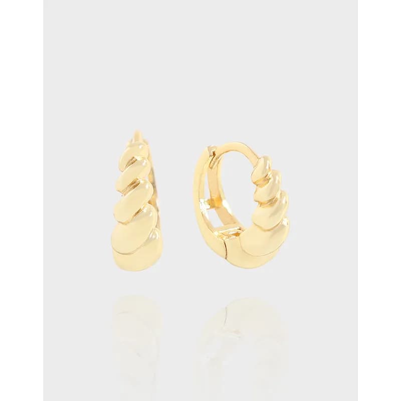 Polished sterling silver hoop earrings with stacked rounded discs on a hinge closure.