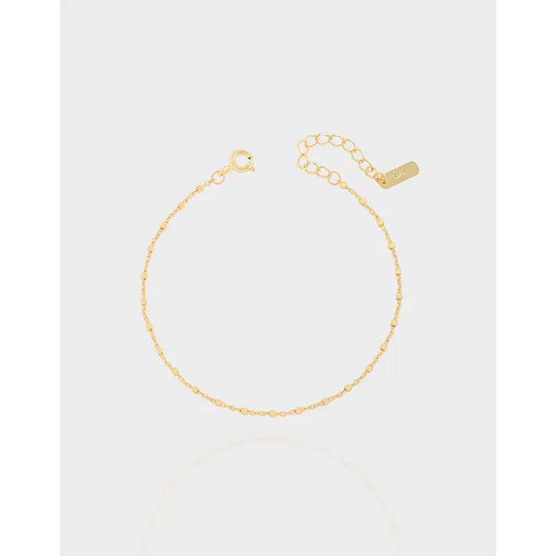 Polished sterling silver bracelet with a beaded cube-link chain and adjustable clasp