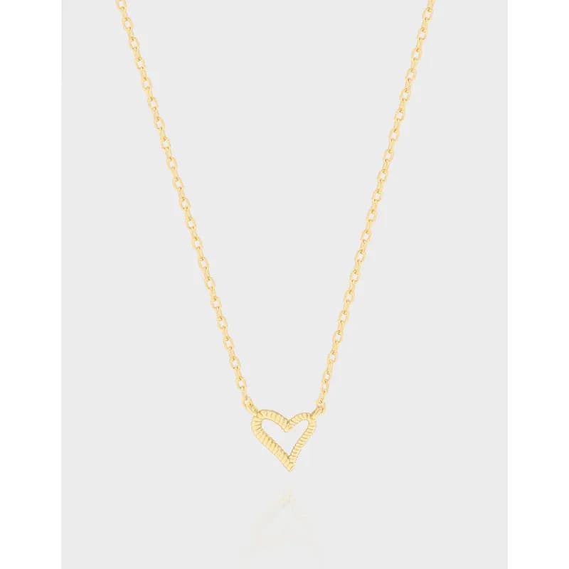 Polished sterling silver open heart pendant on a delicate chain necklace
