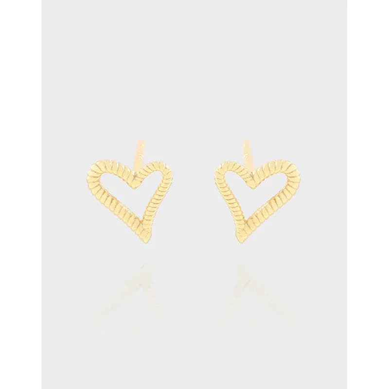 Open-heart ribbed stud earrings in polished sterling silver.