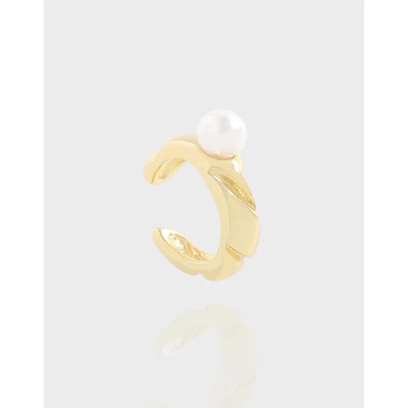 Open gold-tone corset-shaped hoop earring with a single white pearl on top.