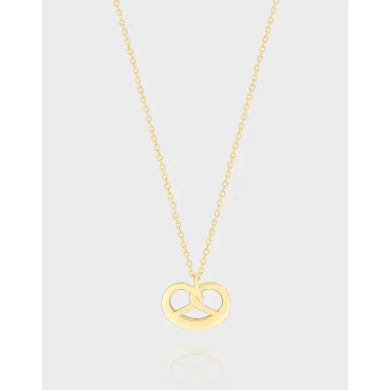 Delicate sterling silver necklace with a polished infinity knot pendant.