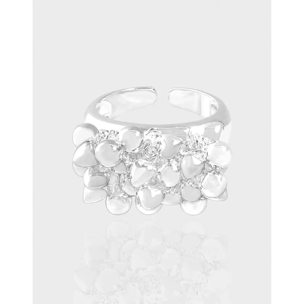 Sterling silver ring with a multi-pebble cluster design on the top