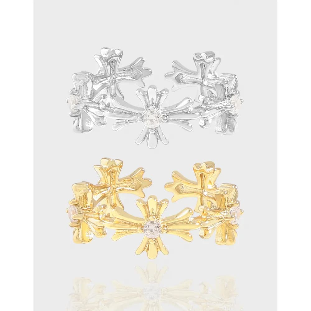 Polished sterling silver floral cluster ring with petal-shaped petals forming a central flower motif.