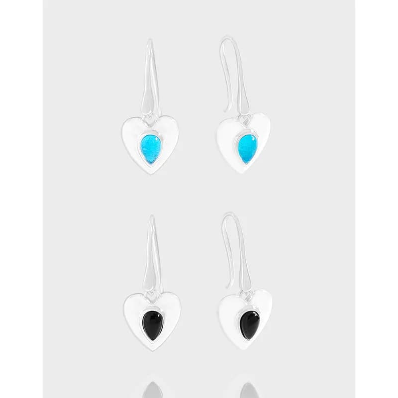 Polished sterling silver heart drop earrings with colored enamel inlay on each heart.