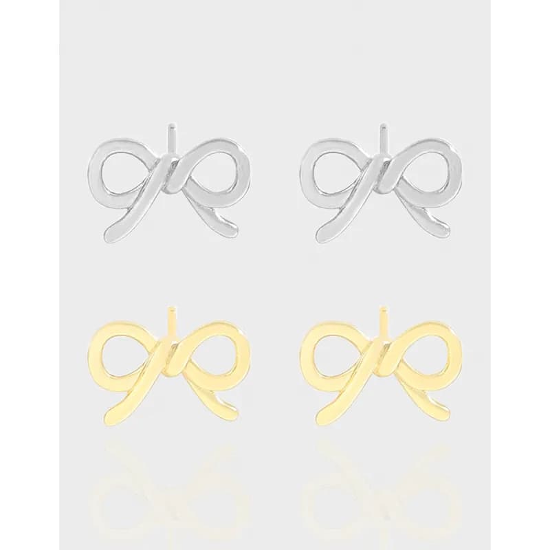 Five pairs of polished bow-shaped stud earrings in silver and gold-tone finishes displayed on a light background.