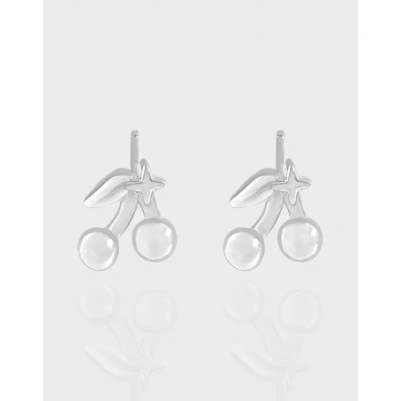 Polished sterling silver cherry drop earrings with leaf and star accents