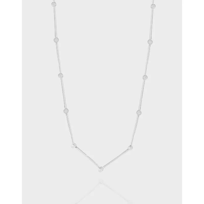 Polished sterling silver necklace with evenly spaced circular beads and a V-shaped drop.