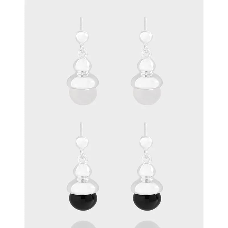 Polished sterling silver stack of three rounded beads forming a drop earring with a ball at the end