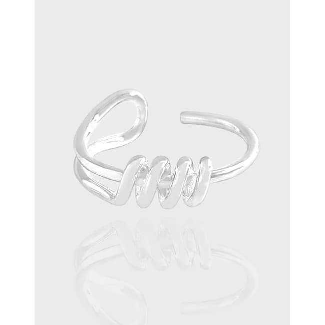 Polished sterling silver open-ring with a three-turn spiral design on a light background.