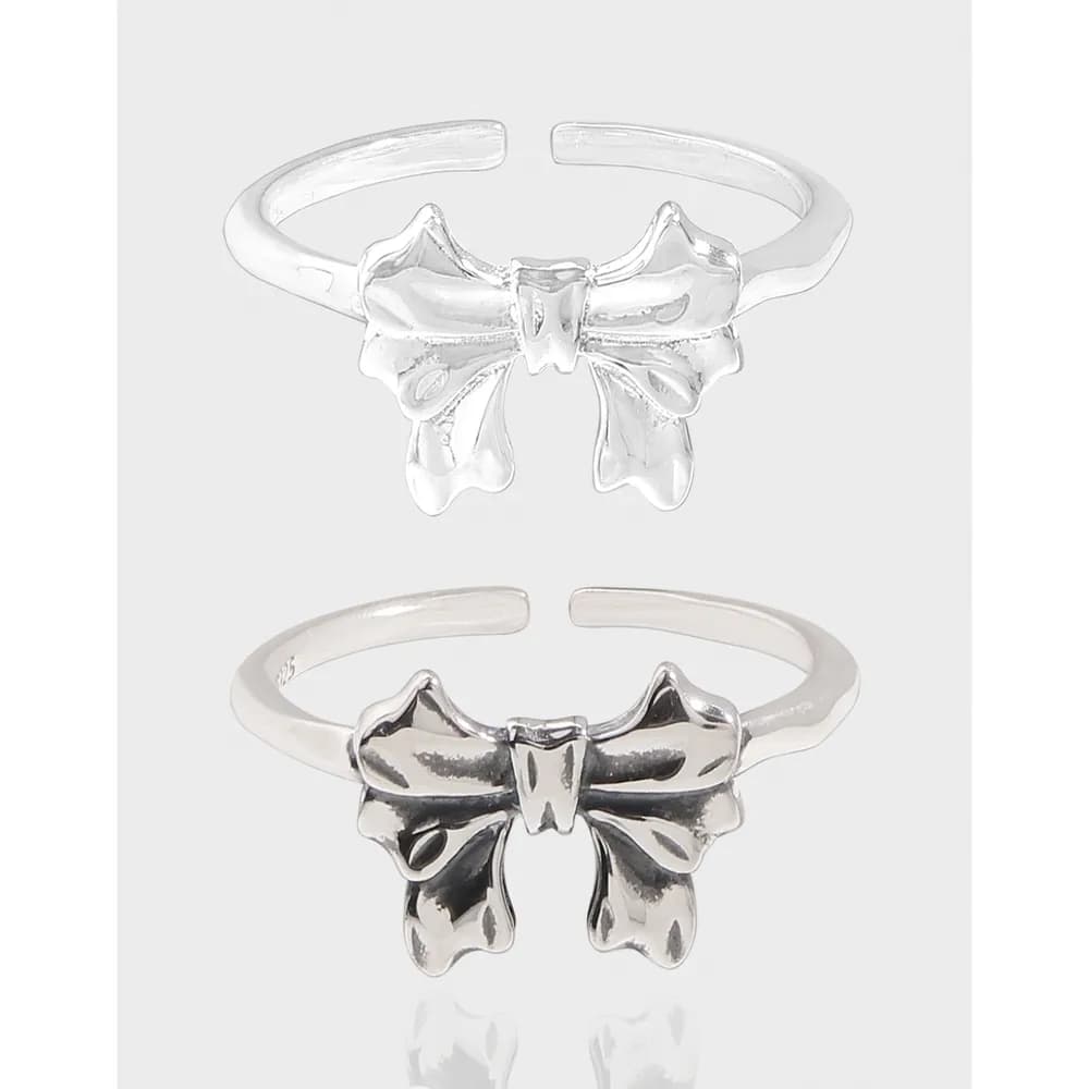 Polished Sterling Silver Bow Ribbon Ring with open back showcase