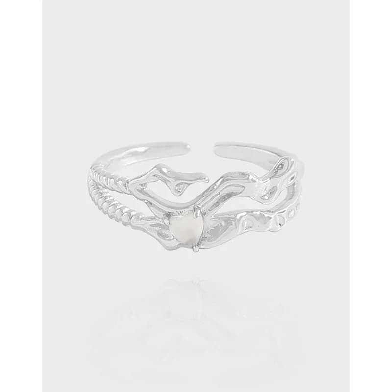 Polished sterling silver ring with intertwining vine bands and a small heart-shaped pearl centerpiece.