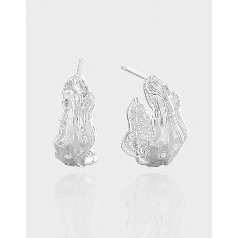Polished sterling silver blob earrings shown from the front with posts