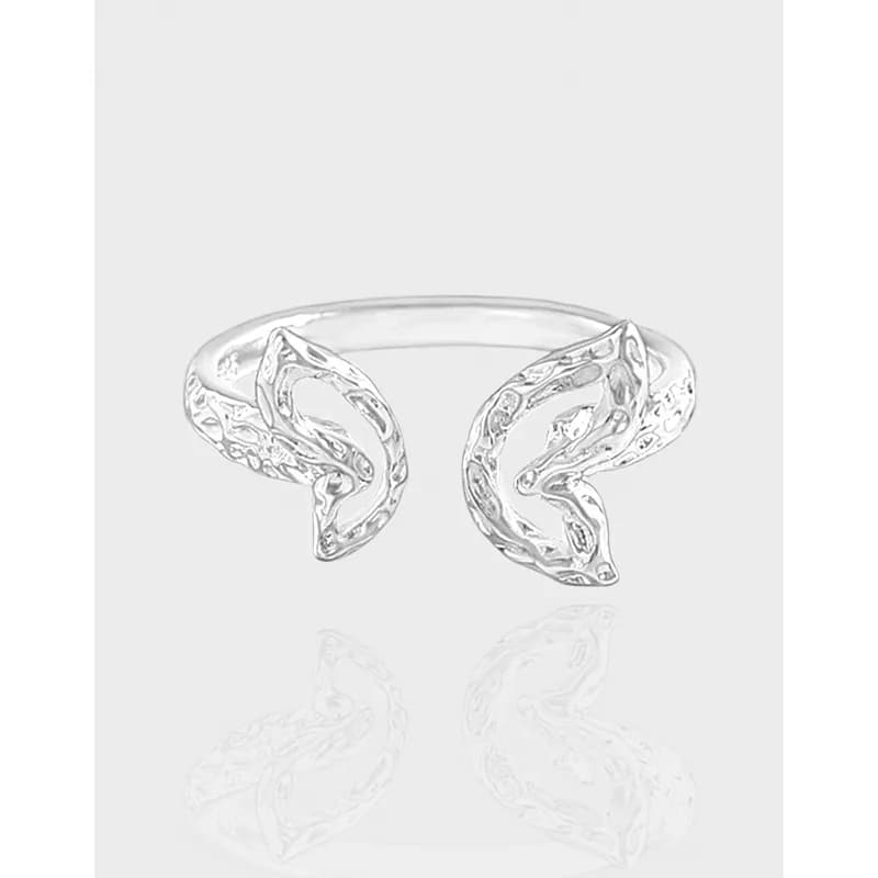 Polished sterling silver open ring with two mirrored crescent shapes facing each other.