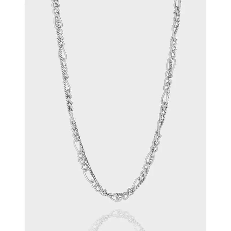 Polished sterling silver necklace with two different chain styles combined in a single strand.