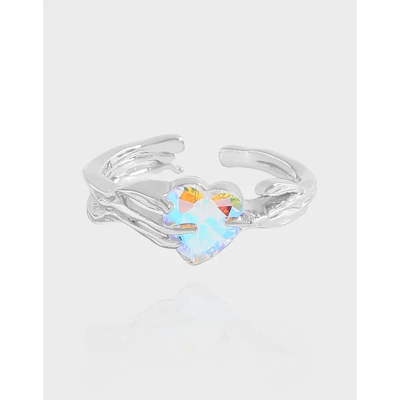 Polished sterling silver Heart Crystal Ring with iridescent heart stone centered on the band.