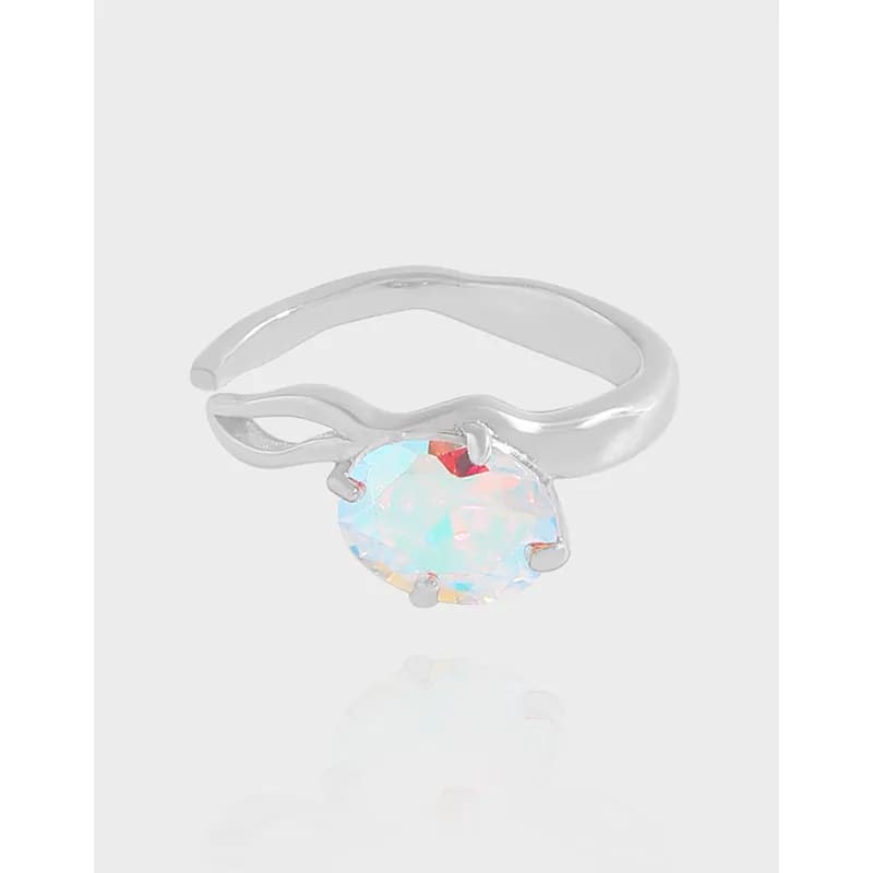 Polished sterling silver ring with an oval iridescent opal gemstone set in four prongs