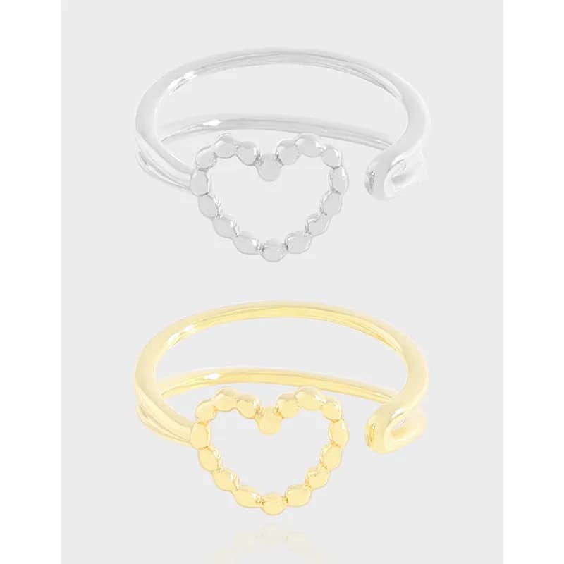 Sterling silver beaded heart ring with an open double band.