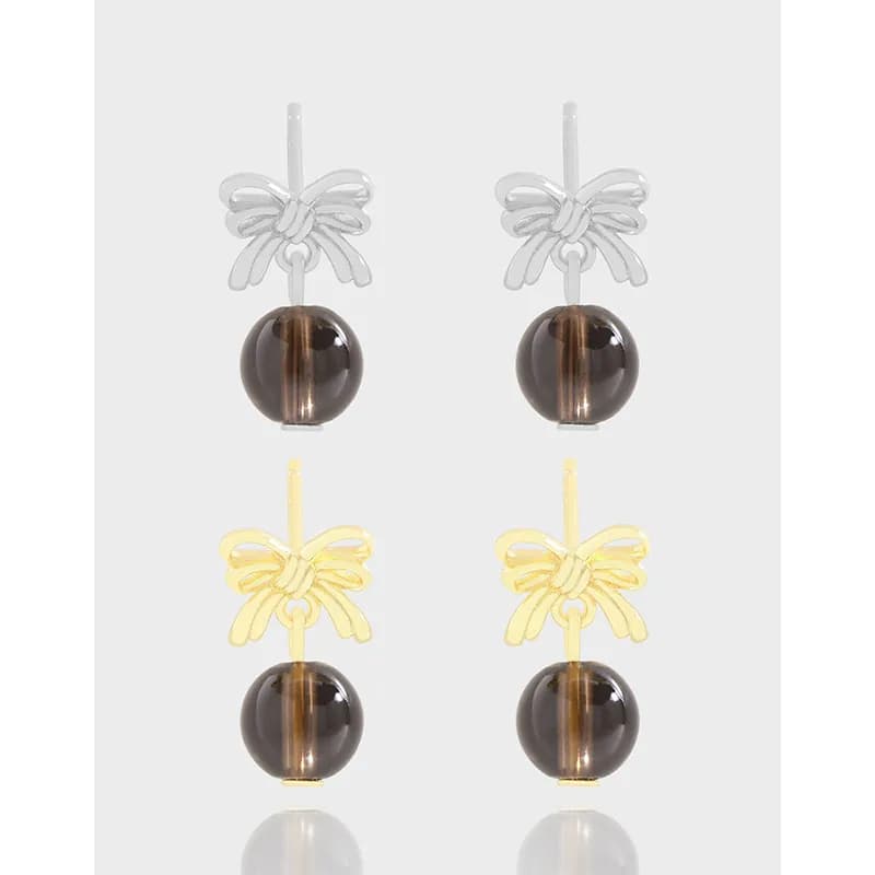 Sterling silver earrings with a bow motif and smoky bead drop