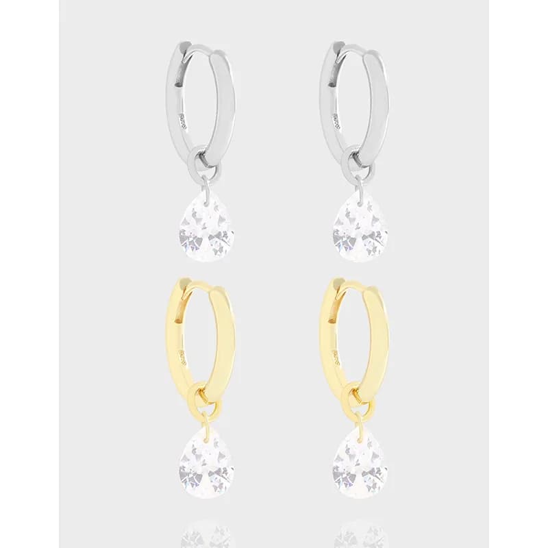 Polished hoop earrings with dangling teardrop crystal drops