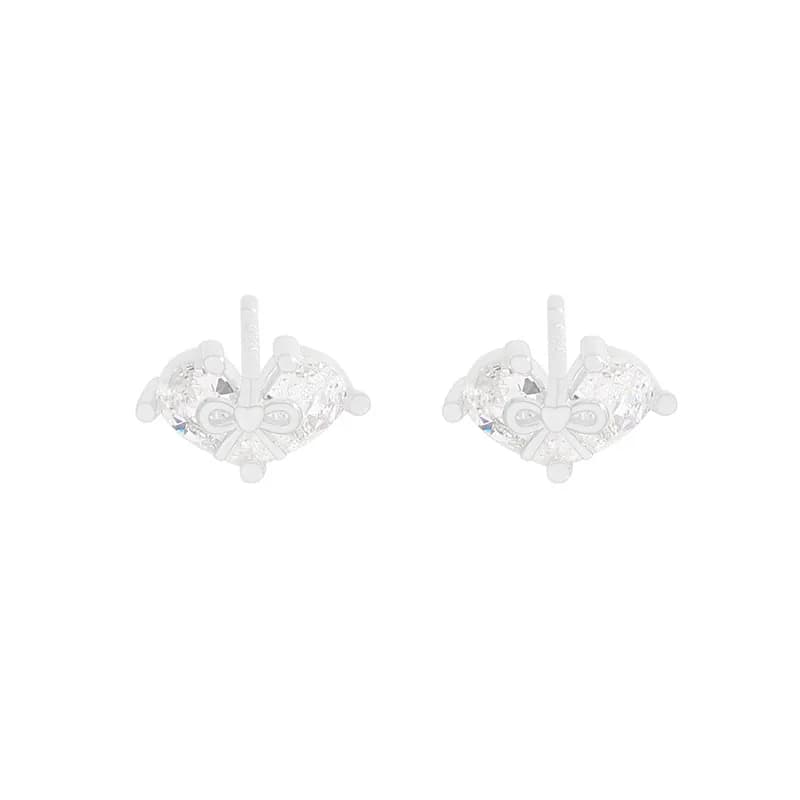 Bow Motif Earrings in Silver — Sterling silver