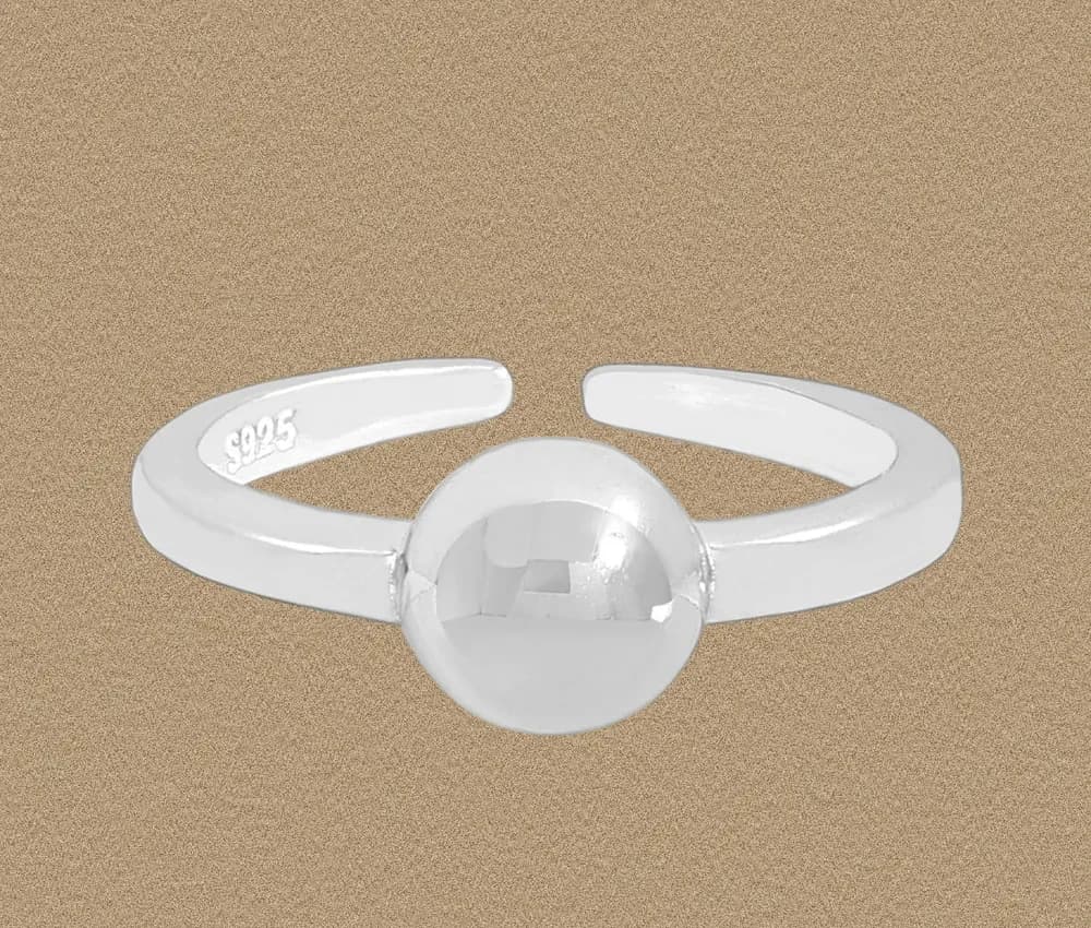 Polished sterling silver ring with a single large sphere centerpiece on an open band.