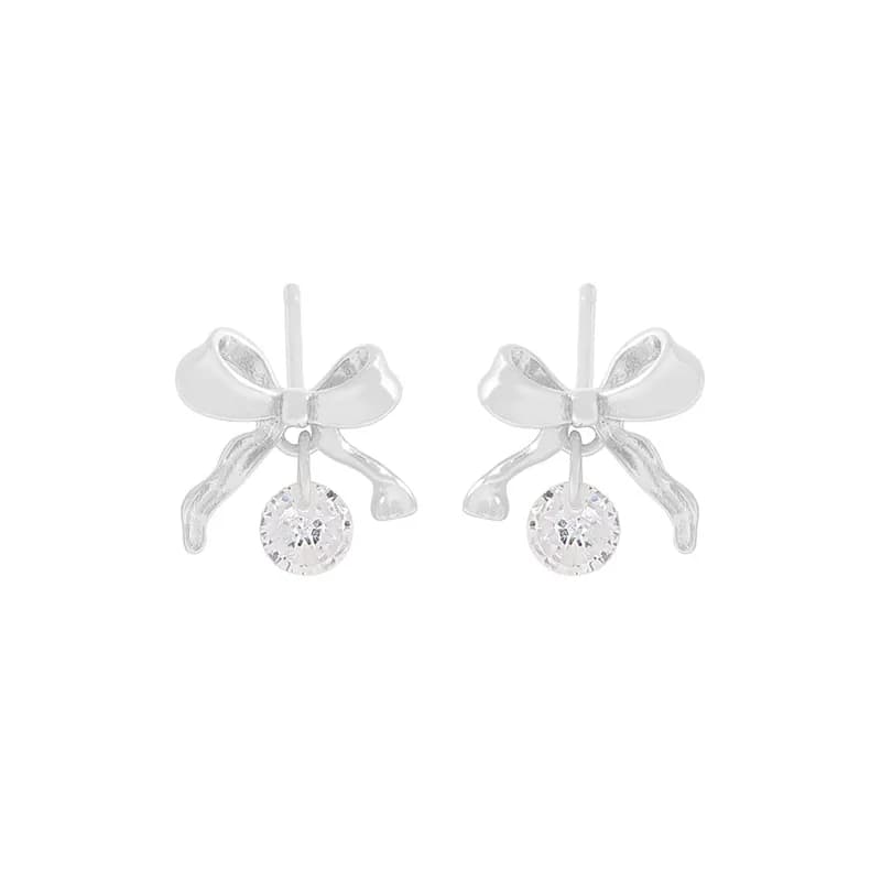 Bow Dangle Earrings in Silver — Sterling silver