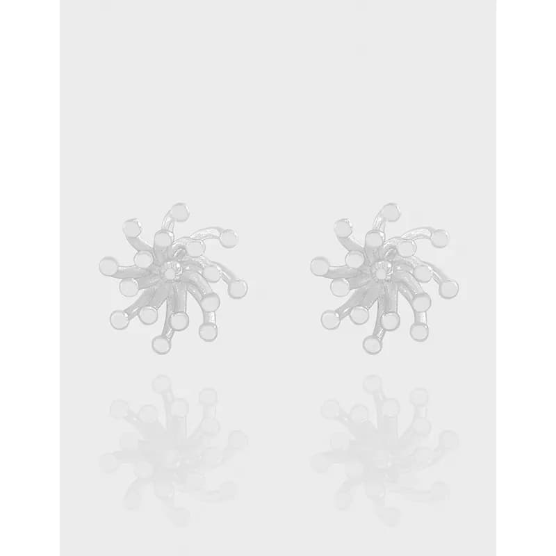 Polished sterling silver starburst cluster earrings with radiating stems and bead-like ends.