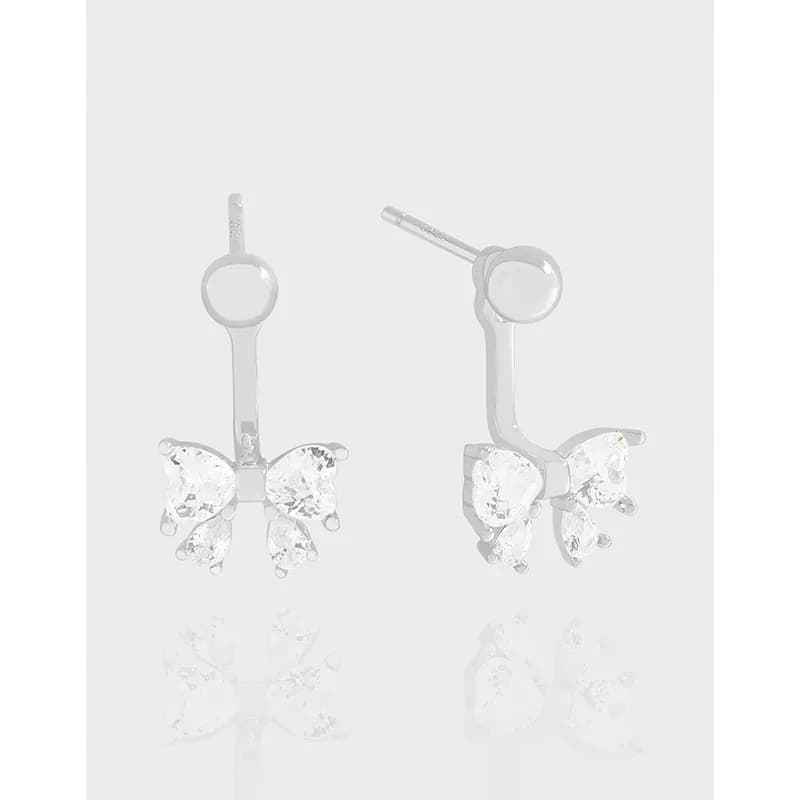 Sterling silver butterfly cluster earrings with a polished finish and drop design.