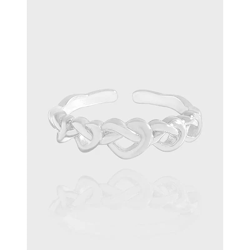 Polished sterling silver chain-link ring displayed front-on with a reflective surface.