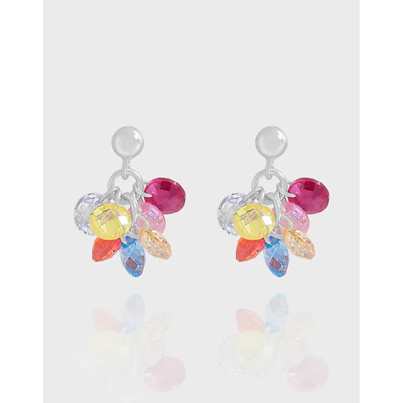 Polished sterling silver drop earrings with a colorful cluster of faceted crystals hanging from a small ball stud.