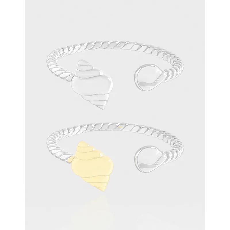 Open-shell heart ring with a twisted rope band in polished silver