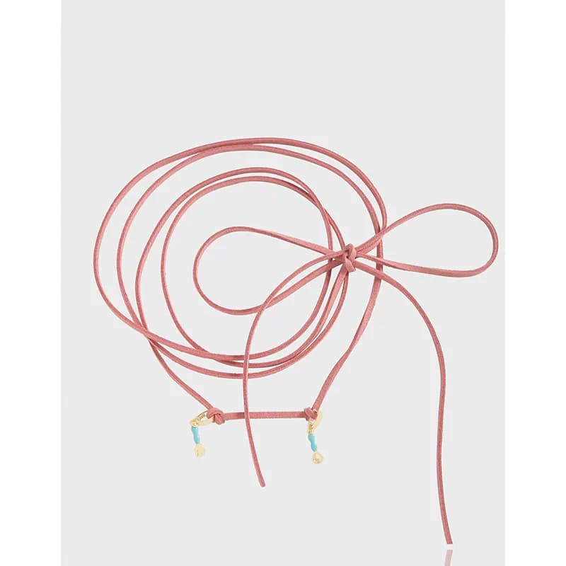 Wrap-style pink cord necklace with multiple loops and beaded end caps.
