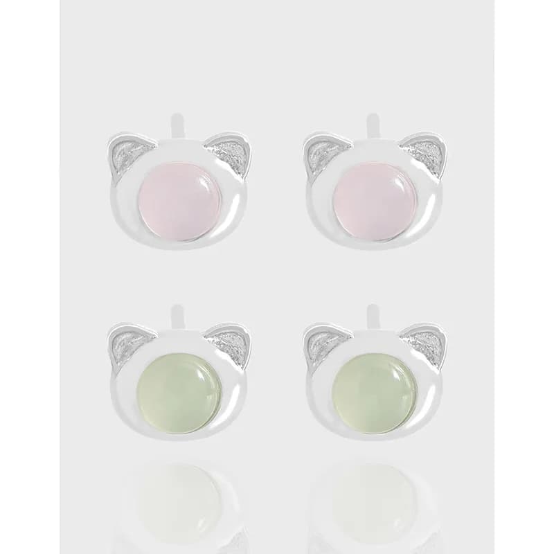 Pair of cat-ear stud earrings with pastel pink and green enamel centers set in silver.